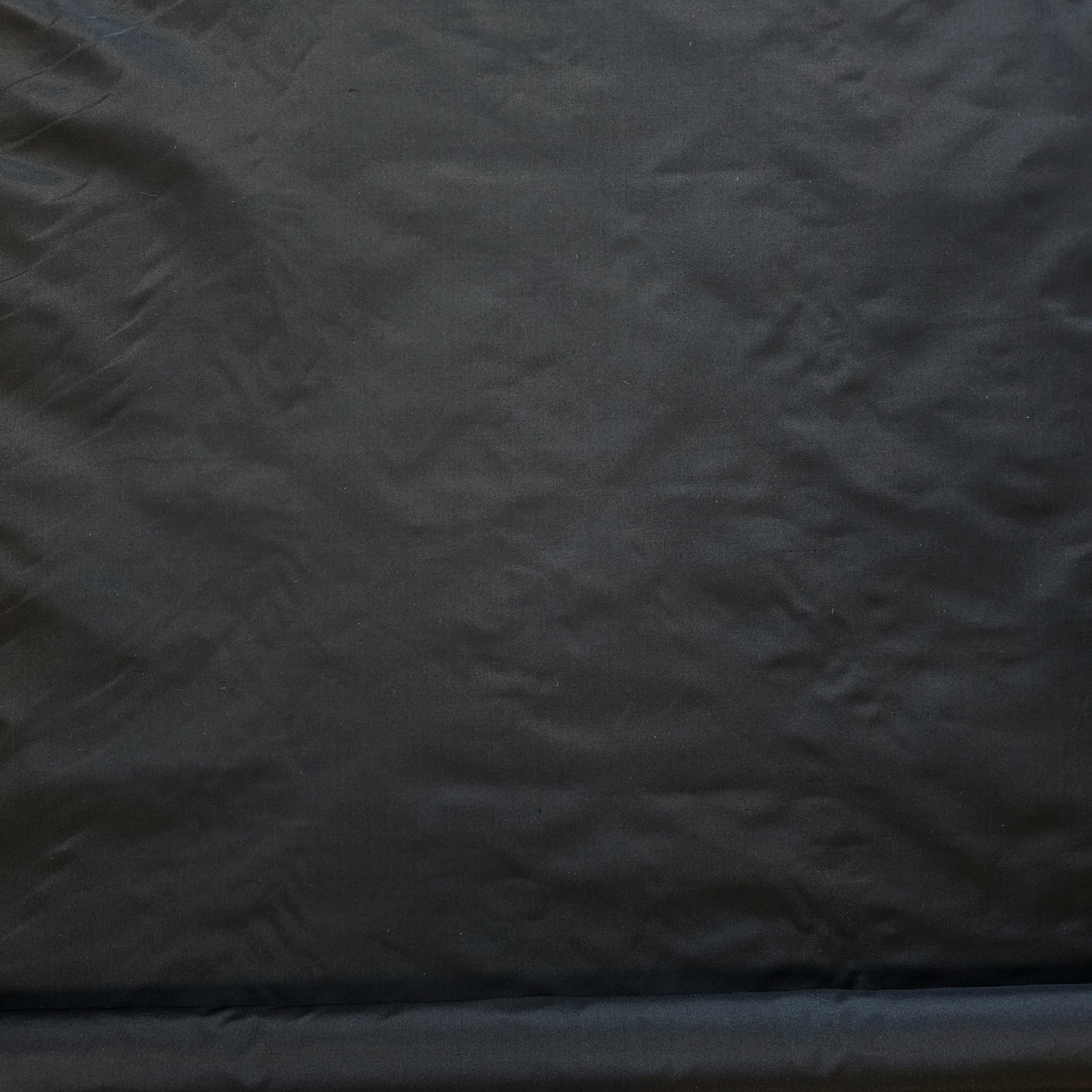 Black Taffeta — a mid-weight silk taffeta with a smooth texture and crisp handle, 100% silk