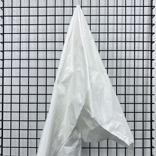 White Taffeta — a mid-weight silk taffeta with a smooth texture and crisp handle, 100% silk