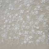 Ivory Sequined Tulle — featuring floral motifs, hand-beading and sequins, 60% rayon 40% nylon, 140cm wide