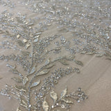 Ivory / Silver Embellished Tulle — featuring a leaf design and hand-beading, 60% rayon 40% nylon, 140cm wide