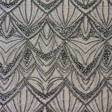 Black / Silver Embellished Tulle — featuring scalloped edges and hand-beading, 60% rayon 40% nylon, 130cm wide
