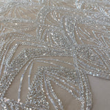 Champagne Embellished Tulle — featuring scalloped edges and hand-beading, 60% rayon 40% nylon, 130cm wide