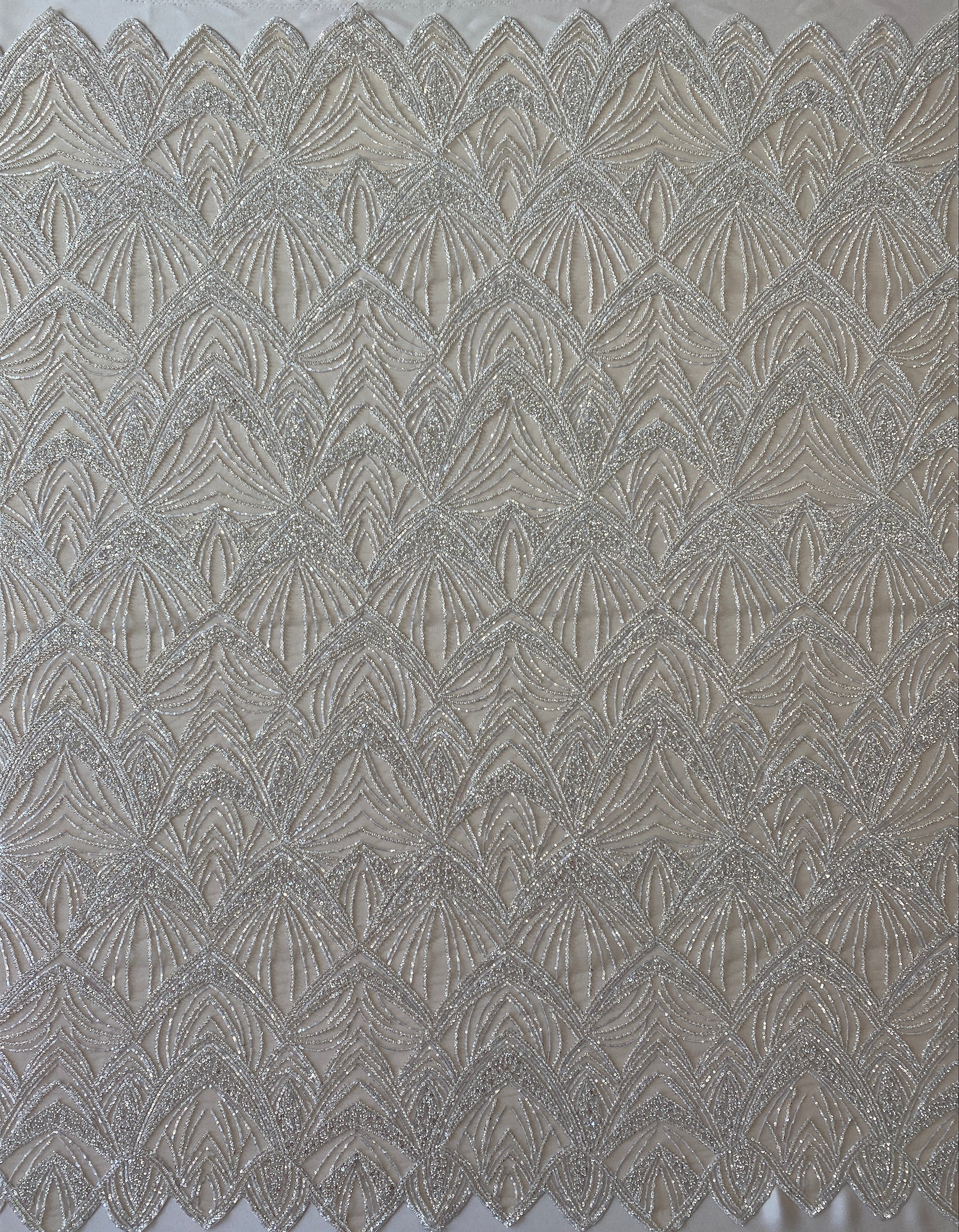 Champagne Embellished Tulle — featuring scalloped edges and hand-beading, 60% rayon 40% nylon, 130cm wide