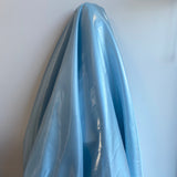 Sky Blue Liquid Satin — smooth and glossy with a liquid, wet-look shimmer, 100% polyester, 150cm wide