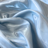 Sky Blue Liquid Satin — smooth and glossy with a liquid, wet-look shimmer, 100% polyester, 150cm wide