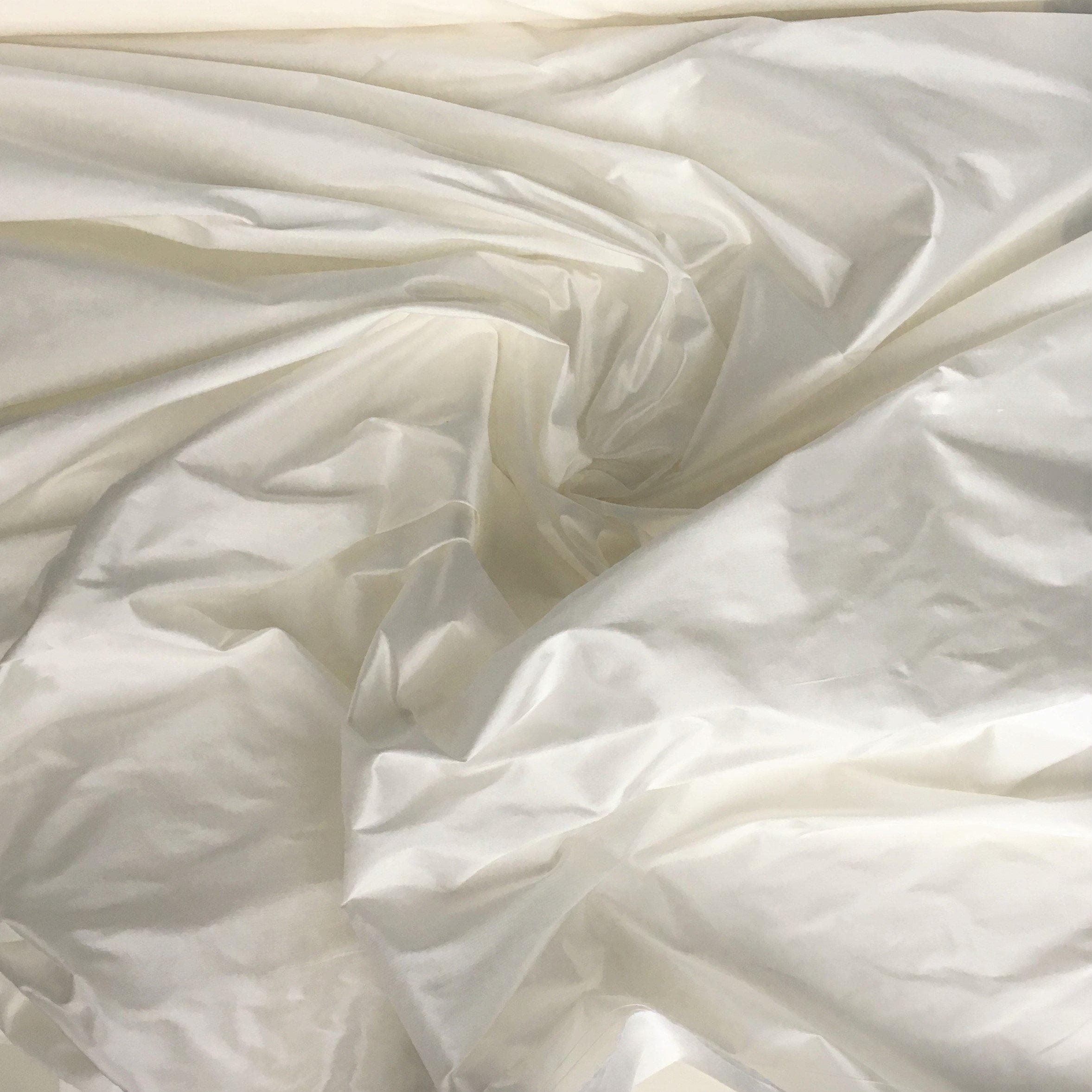Ivory Silk Dupion — mid-weight and crisp with a lightly slubbed texture, 100% silk, 150cm wide