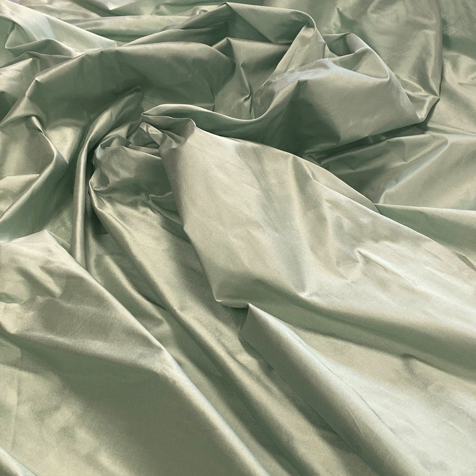 Spearmint Silk Dupion — mid-weight and crisp with a lightly slubbed texture, 100% silk, 137cm wide