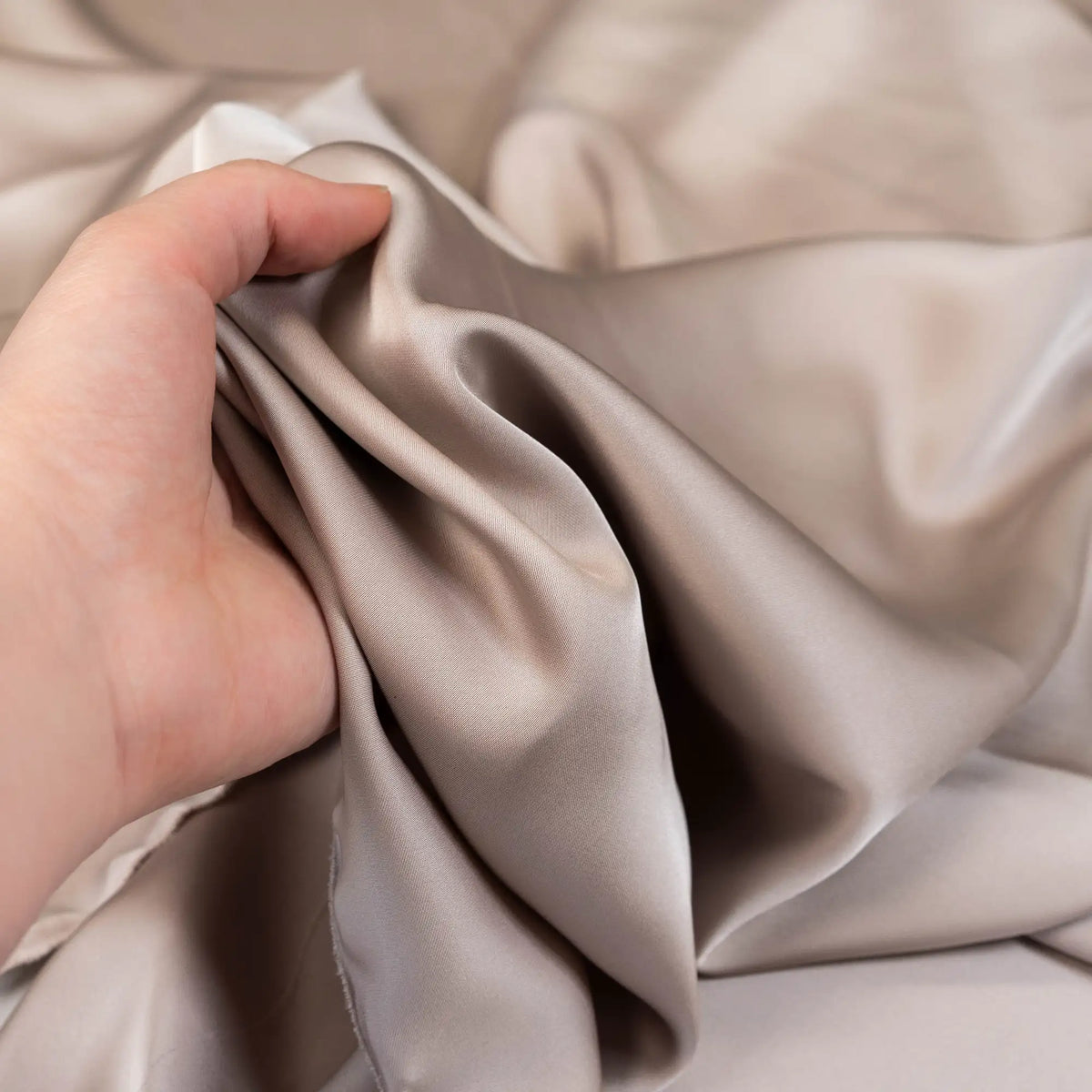 Almond Faux Acetate Satin — mid-weight double-faced polyester satin with a delustered finish, fluid drape and slight stretch