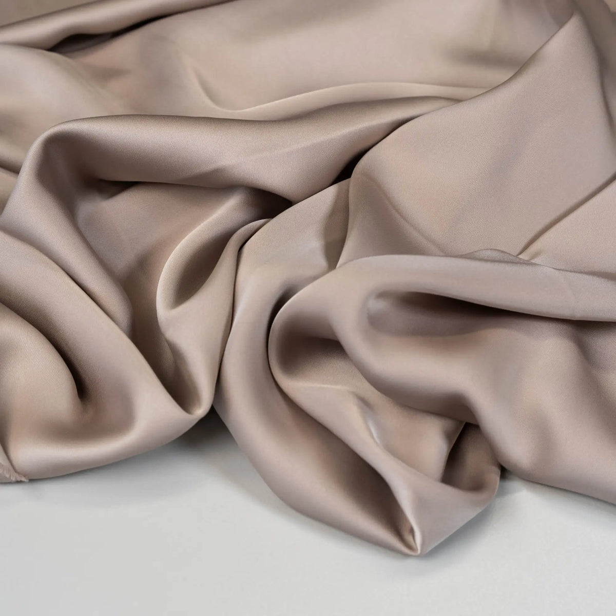 Almond Faux Acetate Satin — mid-weight double-faced polyester satin with a delustered finish, fluid drape and slight stretch