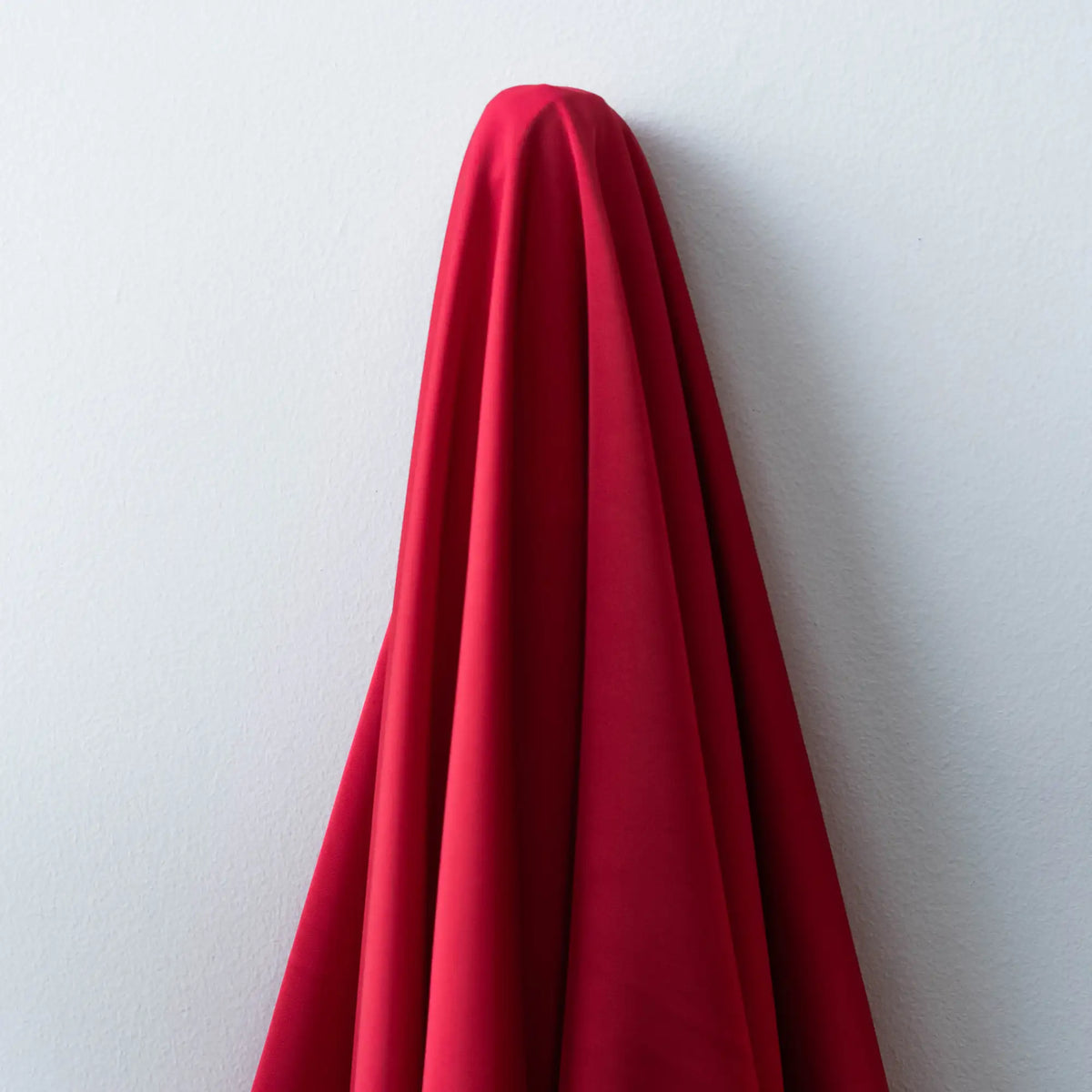 Deep Red Faux Acetate Satin — mid-weight double-faced polyester satin with a delustered finish, fluid drape and slight stretch
