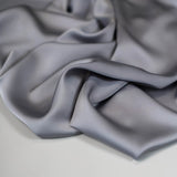 Grey Faux Acetate Satin — mid-weight double-faced polyester satin with a delustered finish, fluid drape and slight stretch