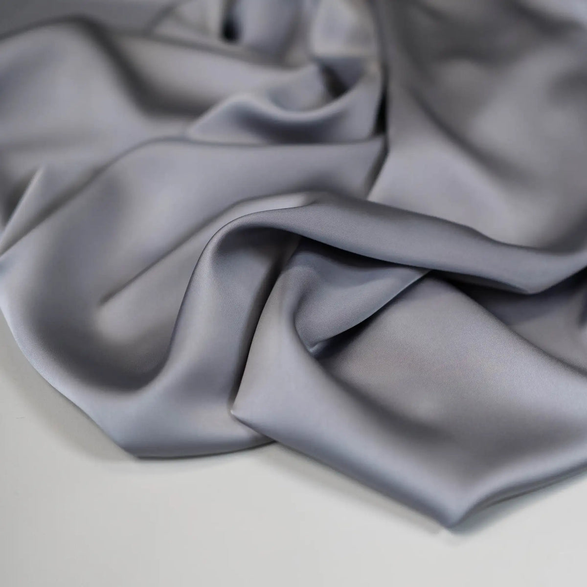 Grey Faux Acetate Satin — mid-weight double-faced polyester satin with a delustered finish, fluid drape and slight stretch
