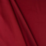 Rust Faux Acetate Satin — mid-weight double-faced polyester satin with a delustered finish, fluid drape and slight stretch