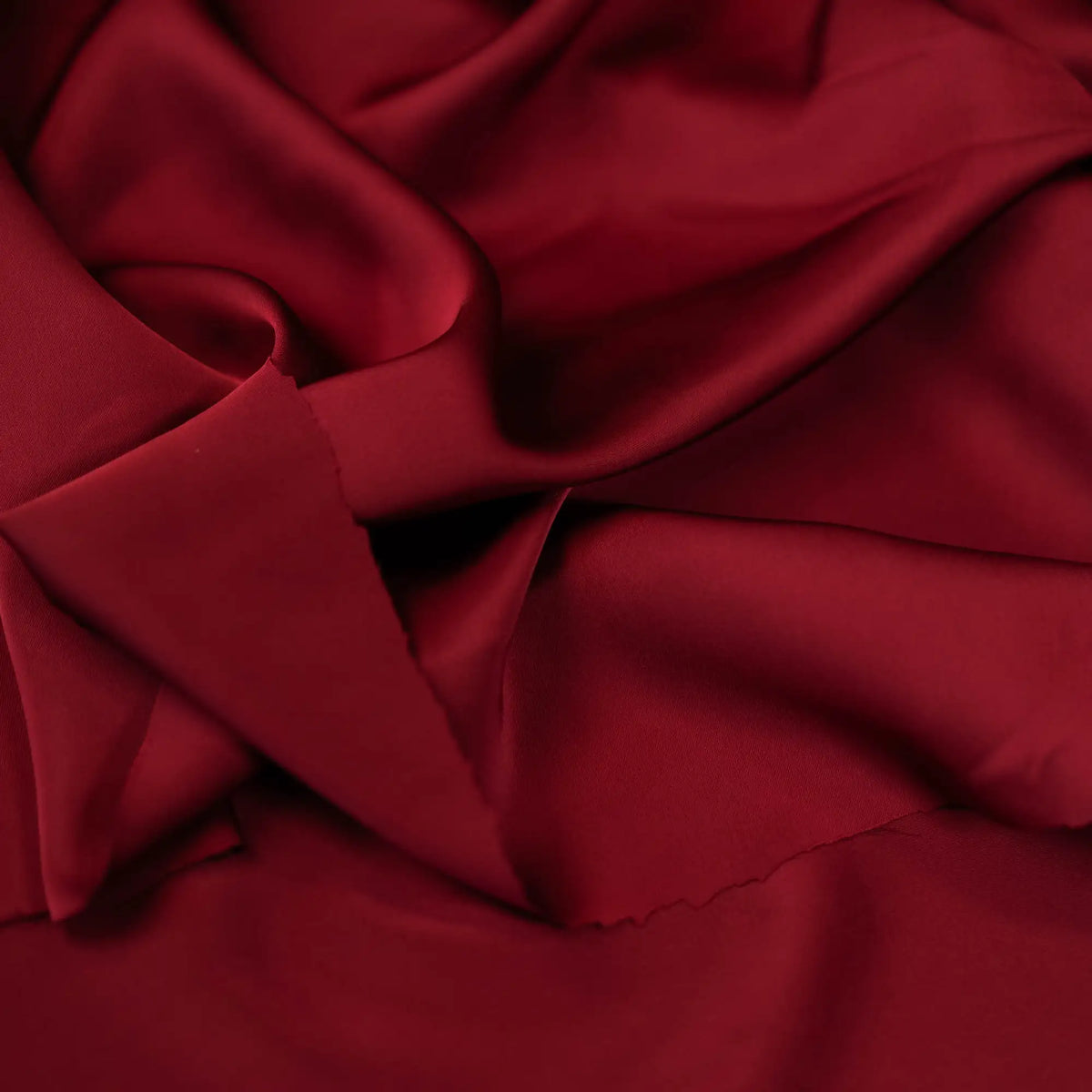Rust Faux Acetate Satin — mid-weight double-faced polyester satin with a delustered finish, fluid drape and slight stretch