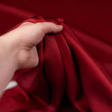 Rust Faux Acetate Satin — mid-weight double-faced polyester satin with a delustered finish, fluid drape and slight stretch