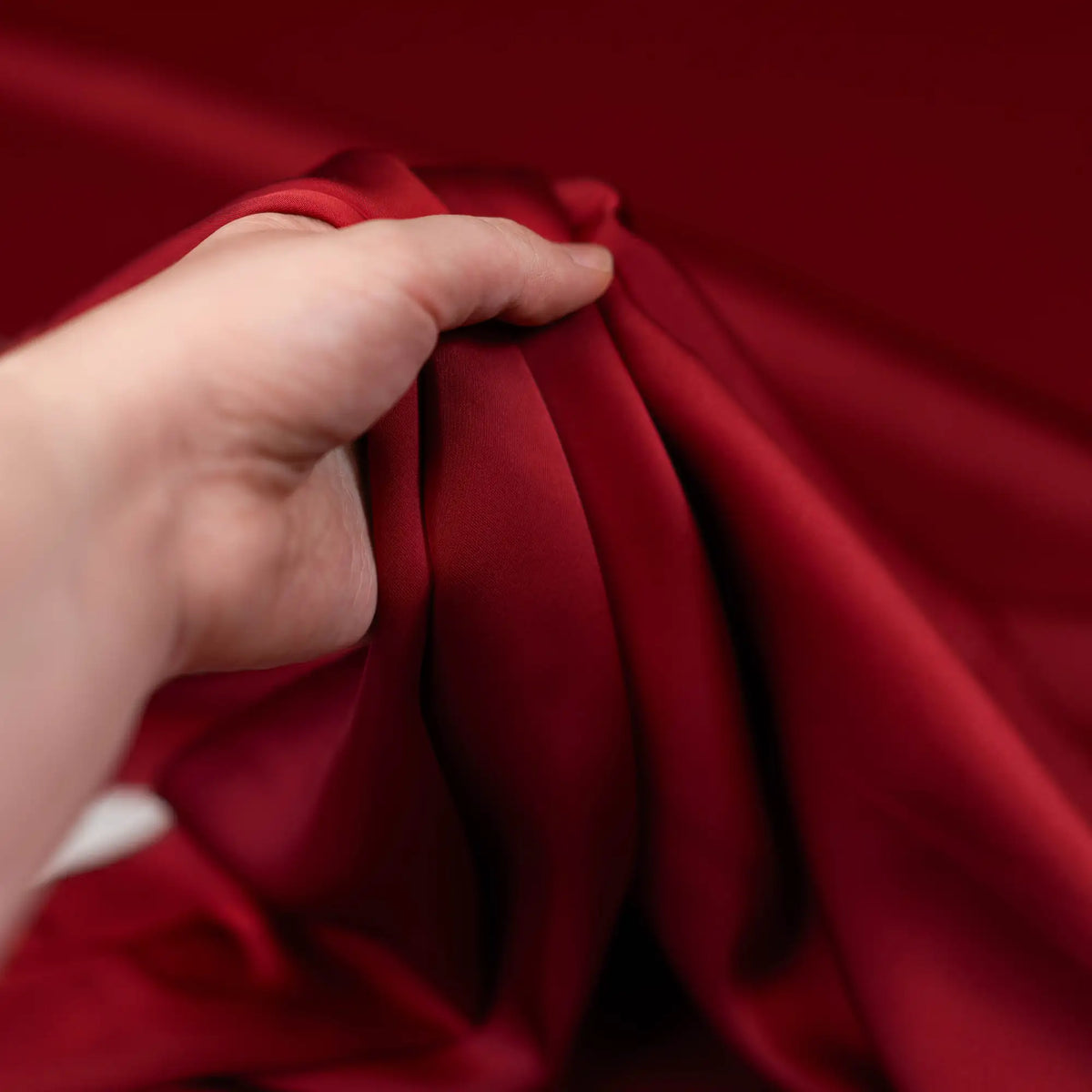 Rust Faux Acetate Satin — mid-weight double-faced polyester satin with a delustered finish, fluid drape and slight stretch