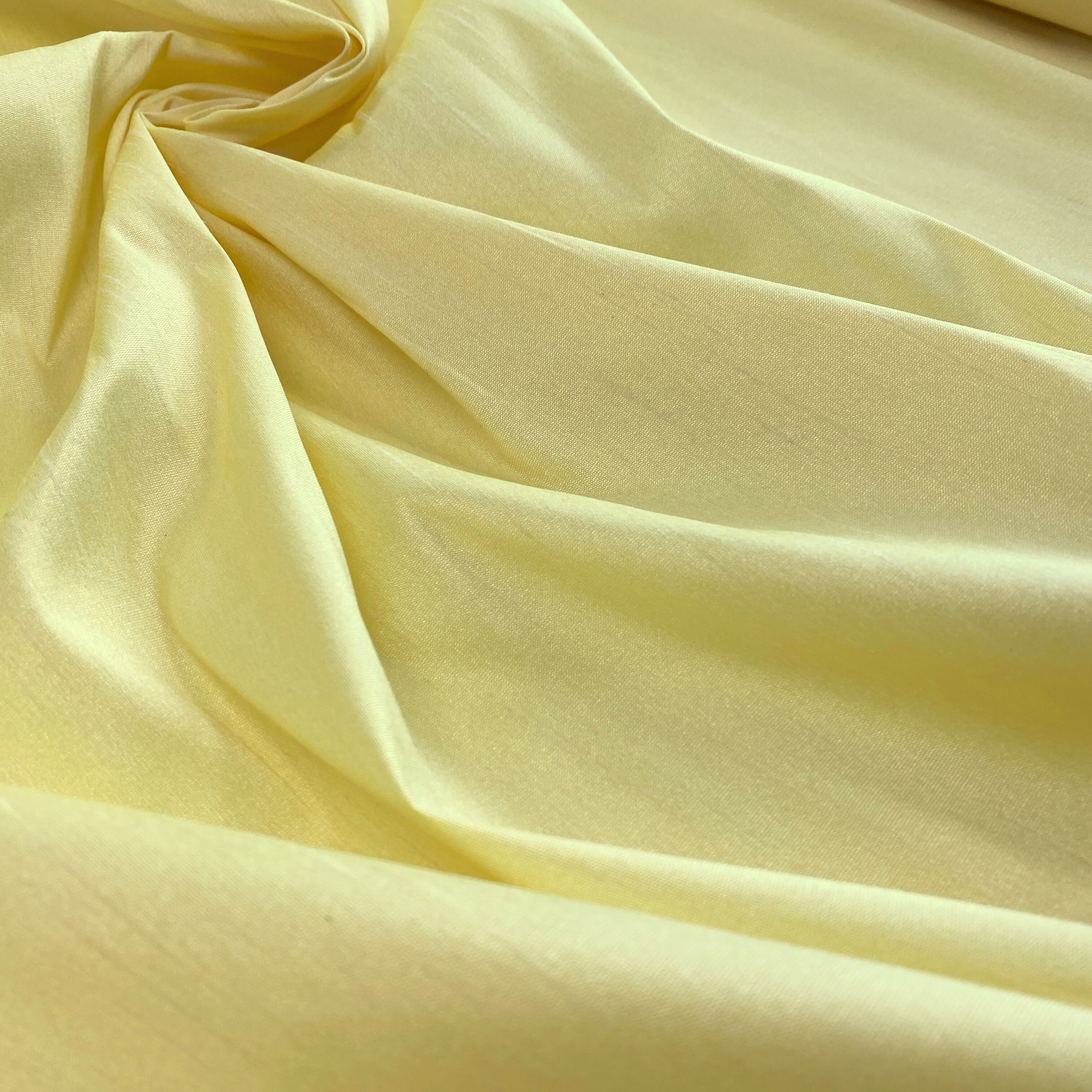 Pastel Yellow Polyester Dupion — mid-weight and crisp with a lightly slubbed texture, 100% polyester, 140cm wide