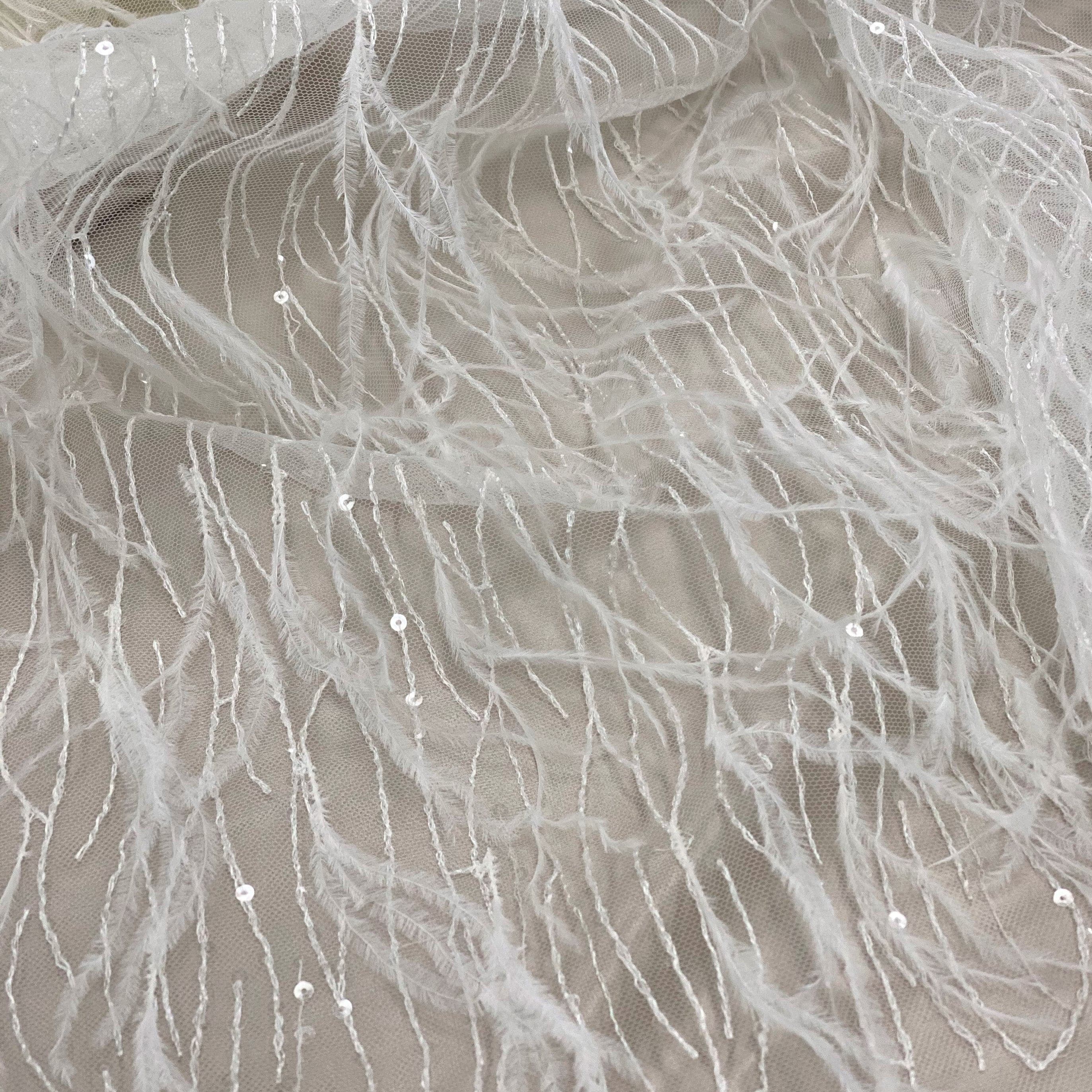 Ivory Feather Tulle — featuring sequins, 40% nylon 40% rayon 20% polyester, 130cm wide