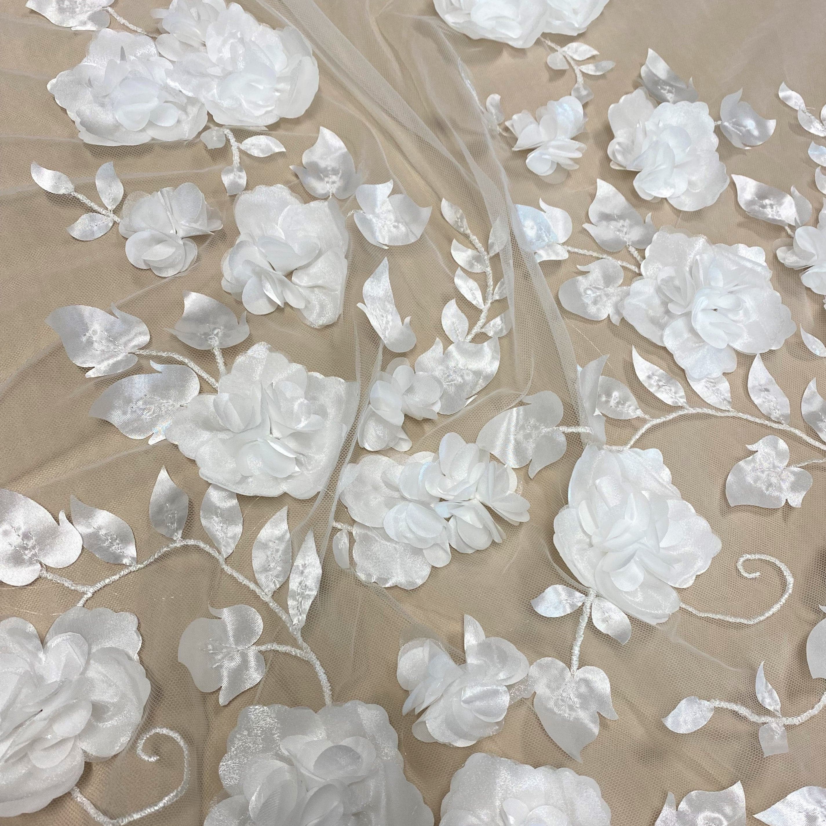 Ivory 3D Floral Tulle — featuring floral motifs, a 3D floral design and a border design, 40% polyester 30% nylon 30% rayon, 130cm wide