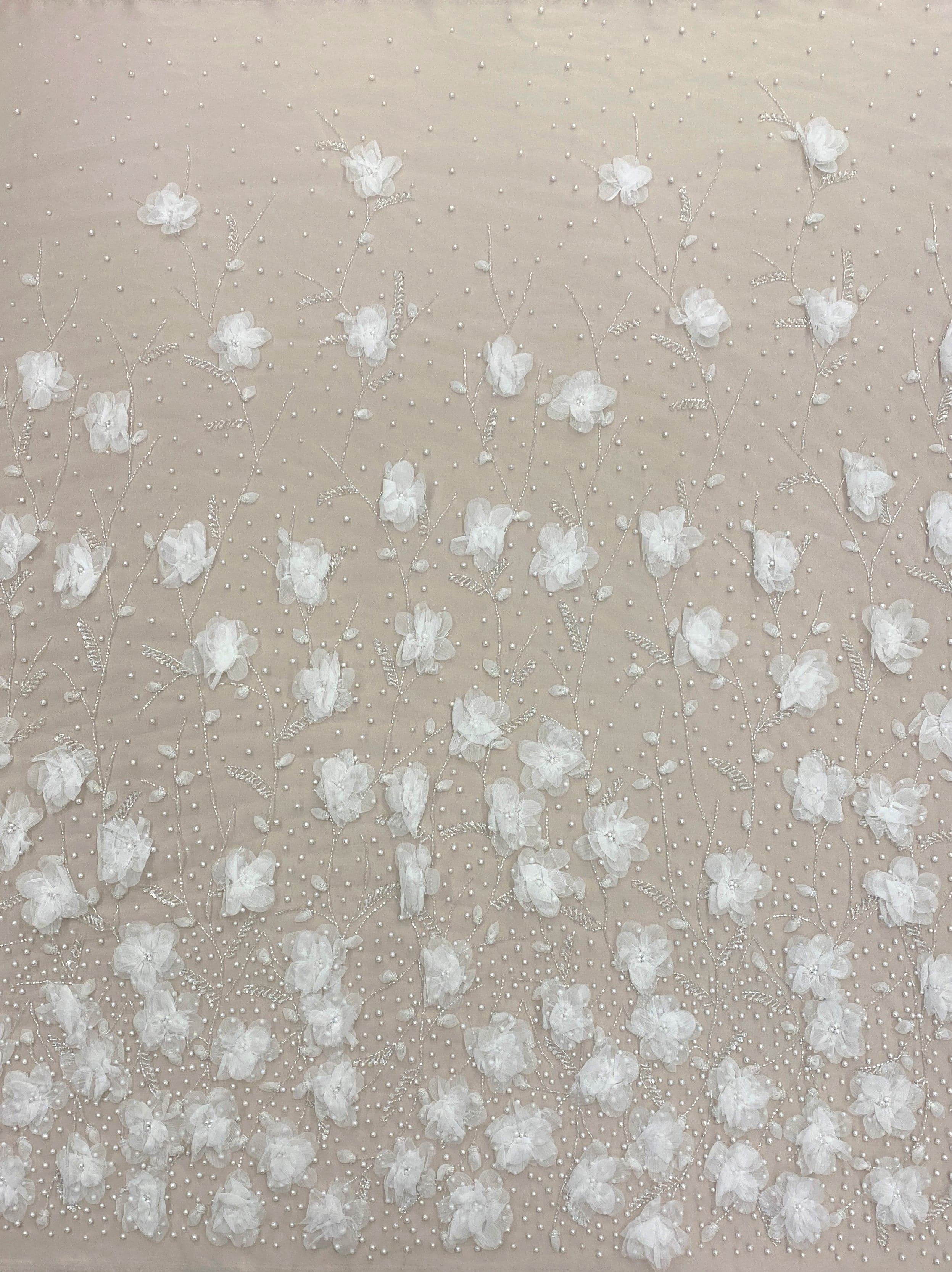 Ivory Embellished 3D Tulle — featuring floral motifs, a 3D floral design and hand-beading, 100% nylon, 140cm wide