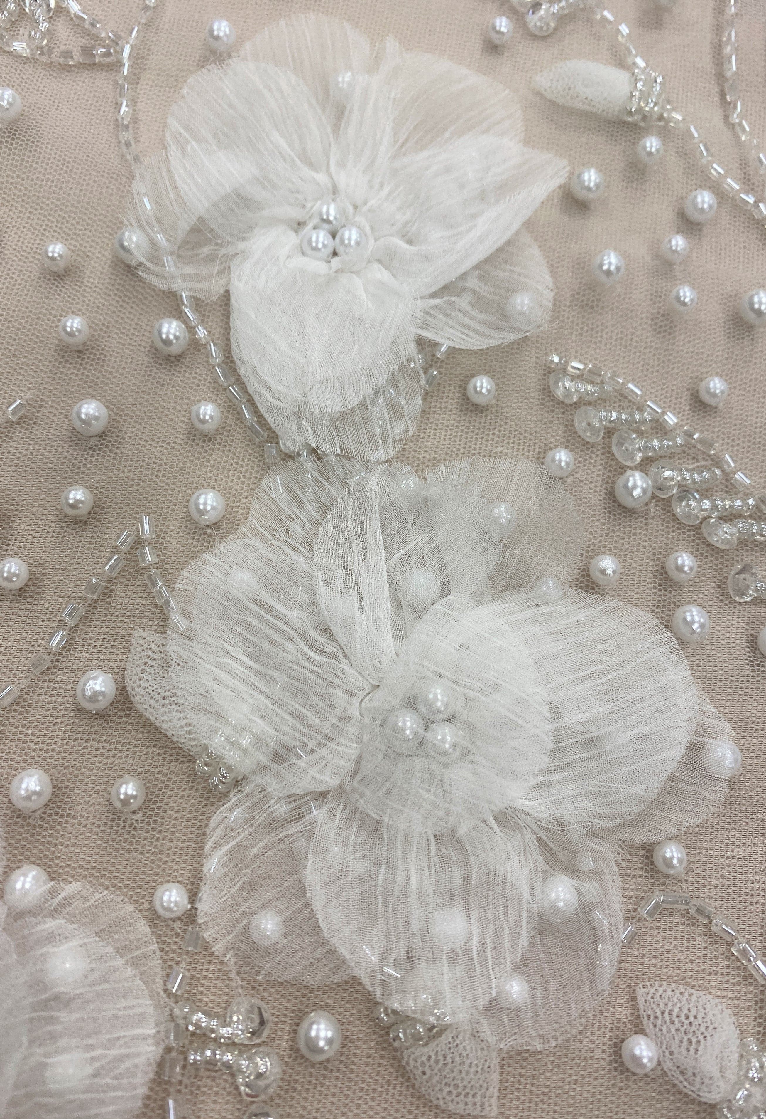 Ivory Embellished 3D Tulle — featuring floral motifs, a 3D floral design and hand-beading, 100% nylon, 140cm wide