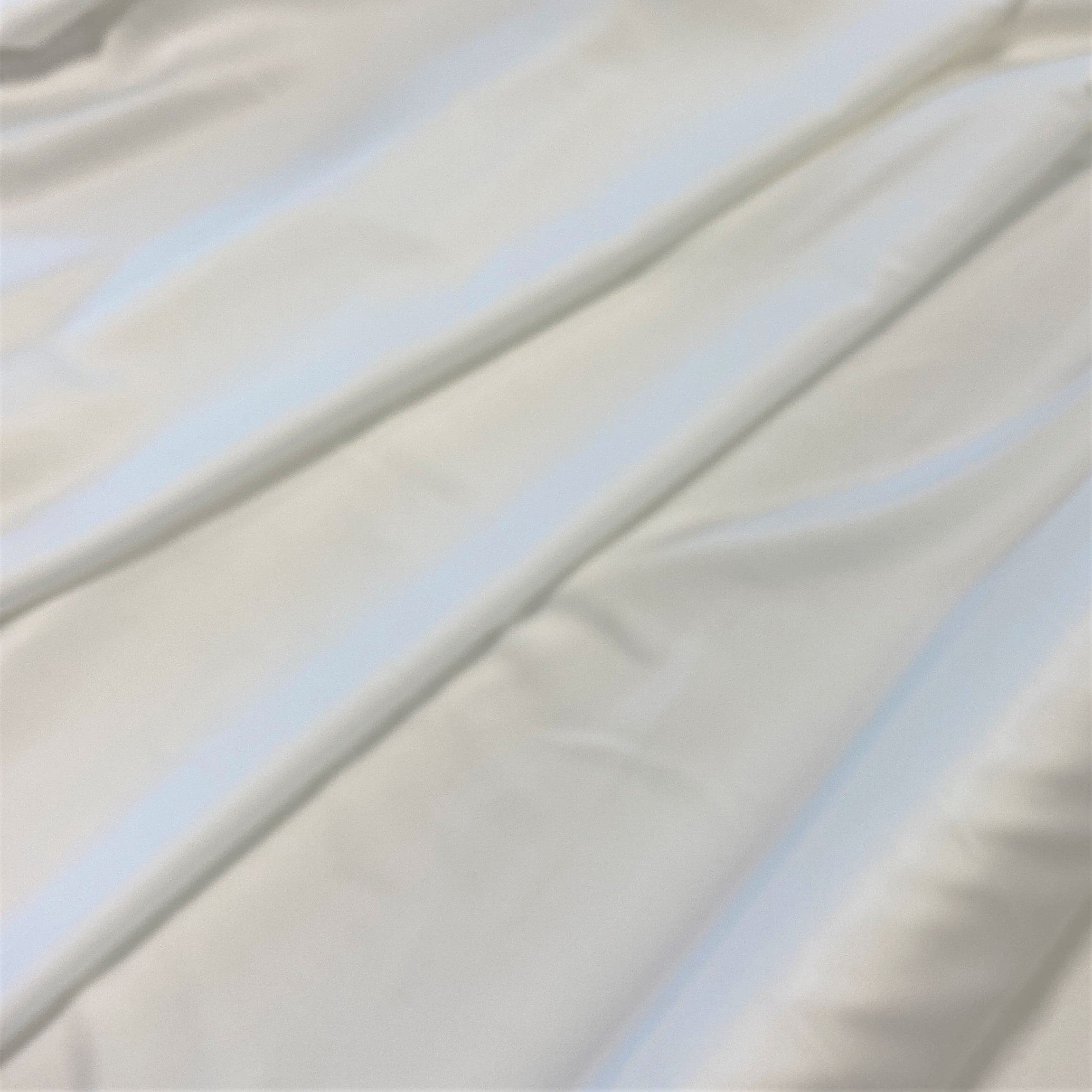Ivory Polyester Lining — lightweight with a satin finish and matte reverse, 100% polyester