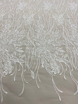 Ivory Embroidered Floral Tulle — featuring floral motifs and hand-beading, 50% nylon 50% rayon, 130cm wide