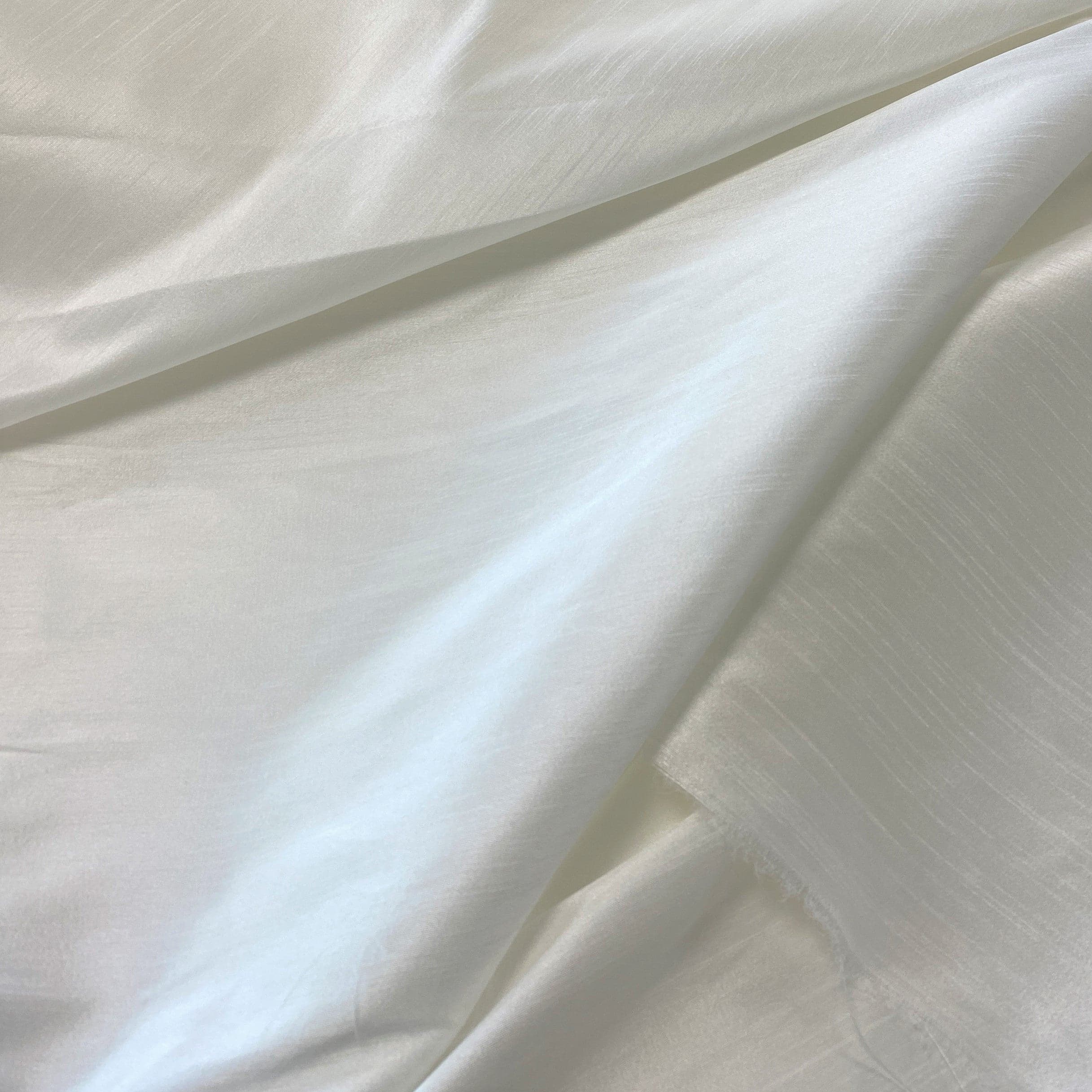 Ivory Polyester Dupion — mid-weight and crisp with a lightly slubbed texture, 100% polyester, 140cm wide