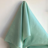 Mint Polyester Dupion — mid-weight and crisp with a lightly slubbed texture, 100% polyester, 140cm wide
