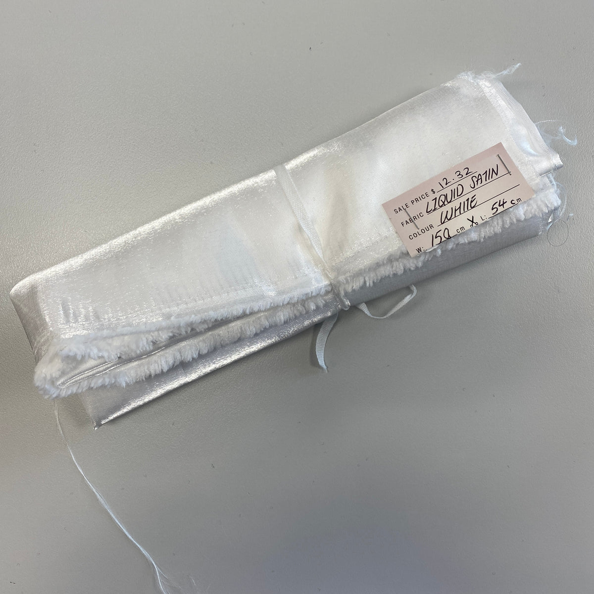 Remnant Liquid Satin - White
