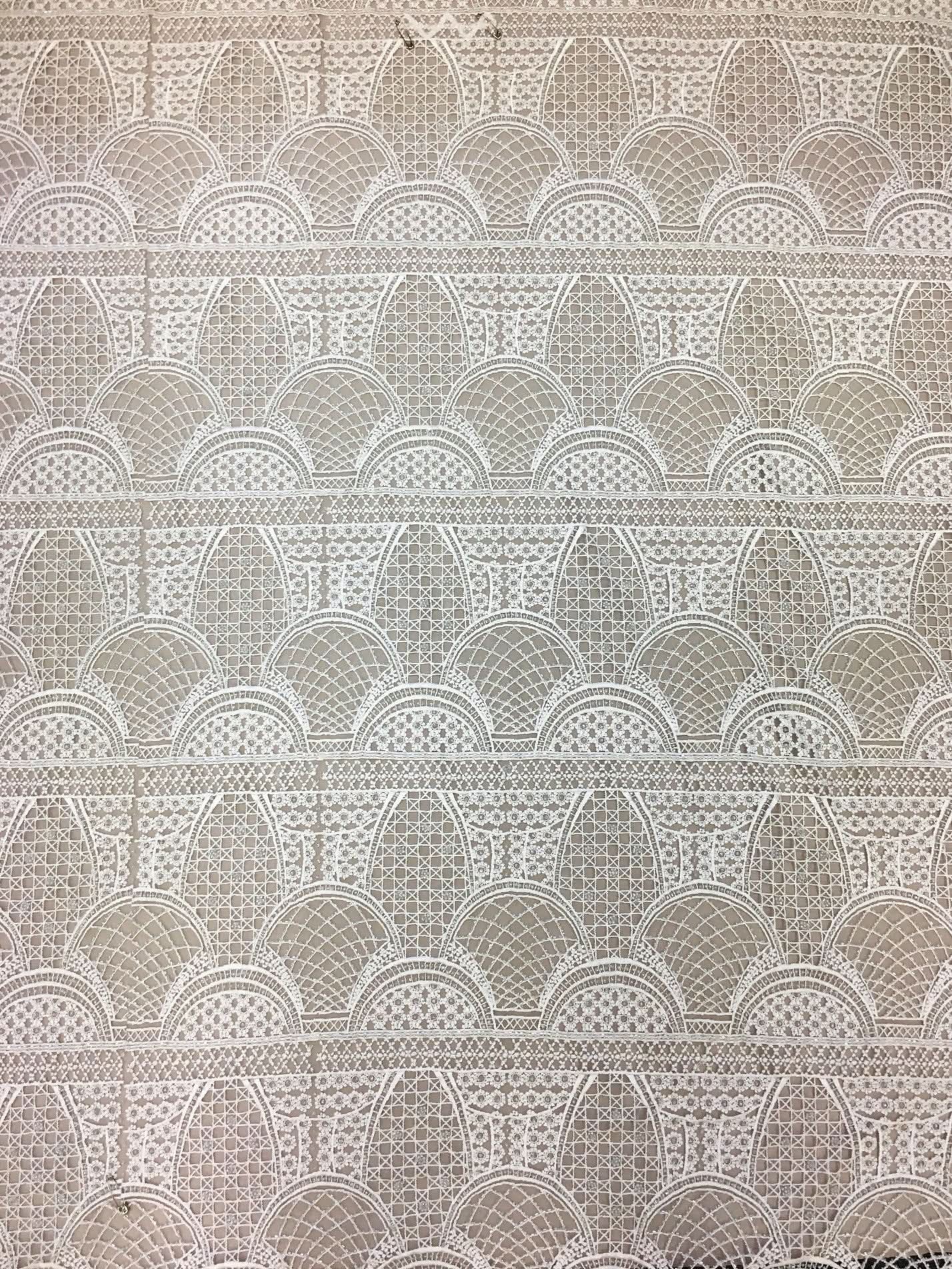 Ivory Geometric Embellished Tulle — featuring geometric motifs and hand-beading, 100% nylon, 110cm wide