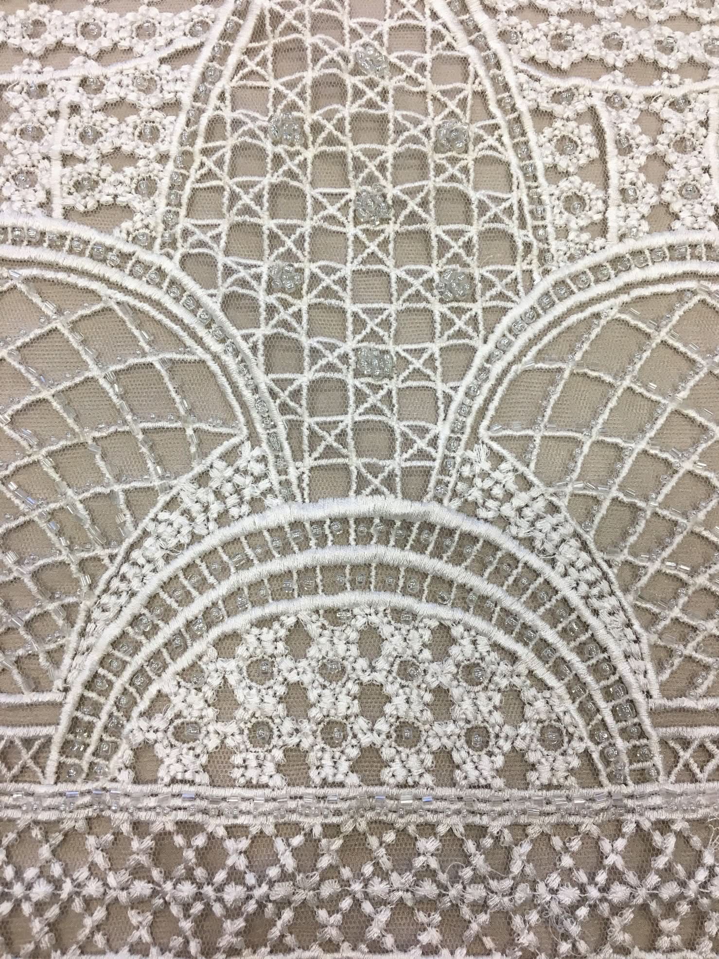 Ivory Geometric Embellished Tulle — featuring geometric motifs and hand-beading, 100% nylon, 110cm wide
