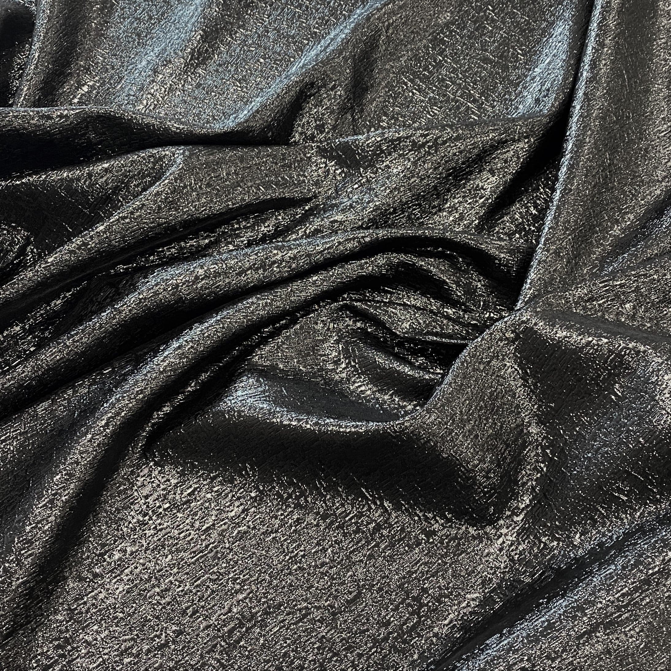 Black Metallic Jacquard — featuring a woven metallic jacquard design with a soft feel and stiff drape, 140cm wide