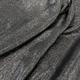 Black Metallic Jacquard — featuring a woven metallic jacquard design with a soft feel and stiff drape, 140cm wide