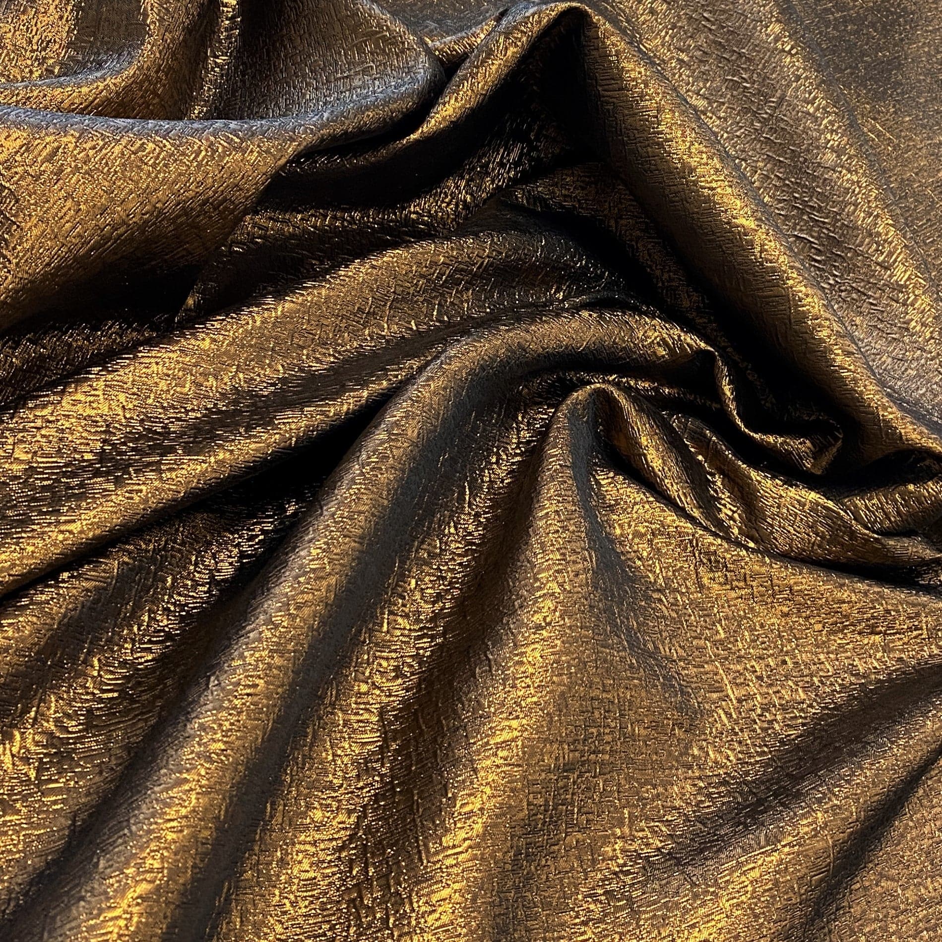 Copper Metallic Jacquard — featuring a woven metallic jacquard design with a soft feel and stiff drape, 140cm wide
