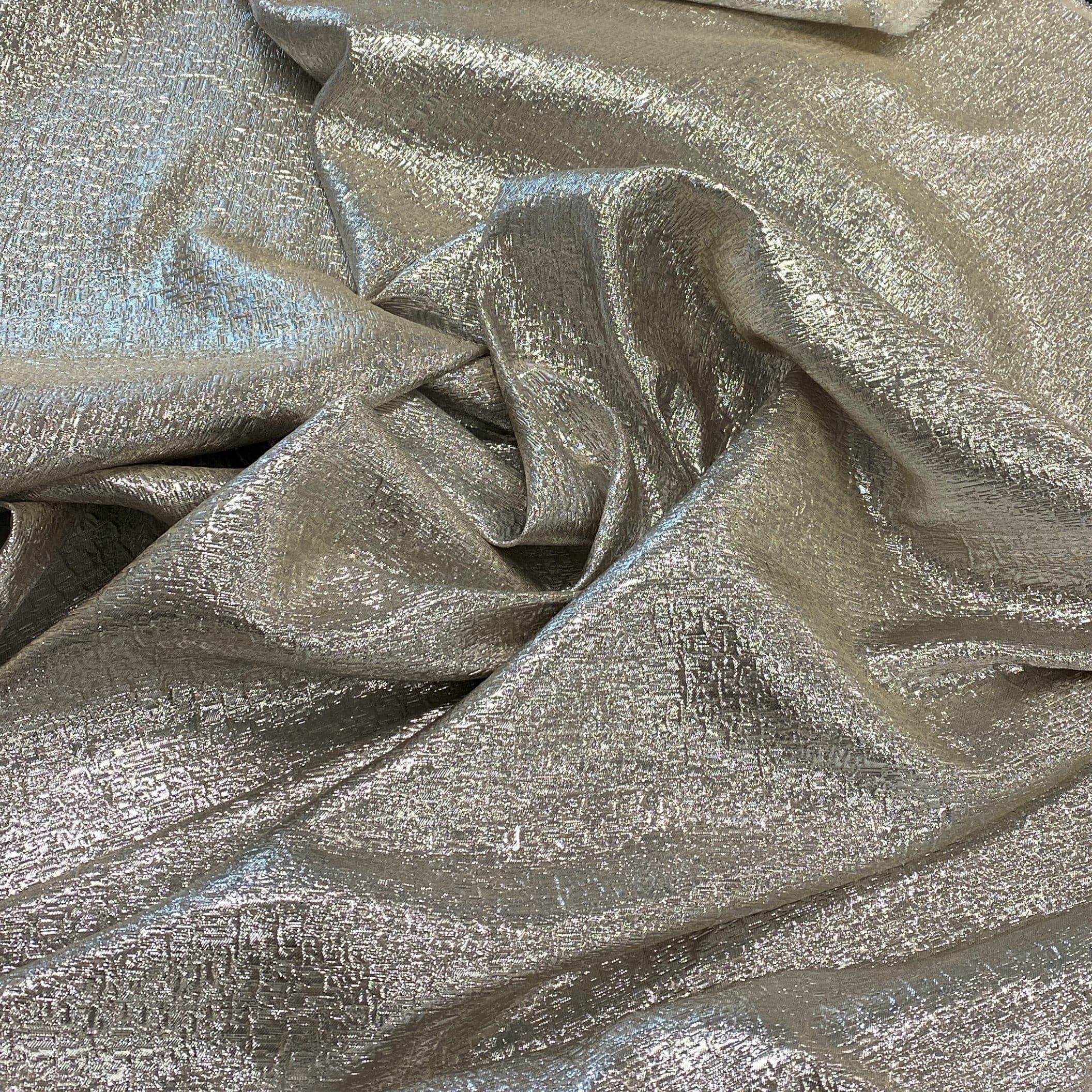 White Gold Metallic Jacquard — featuring a woven metallic jacquard design with a soft feel and stiff drape, 140cm wide