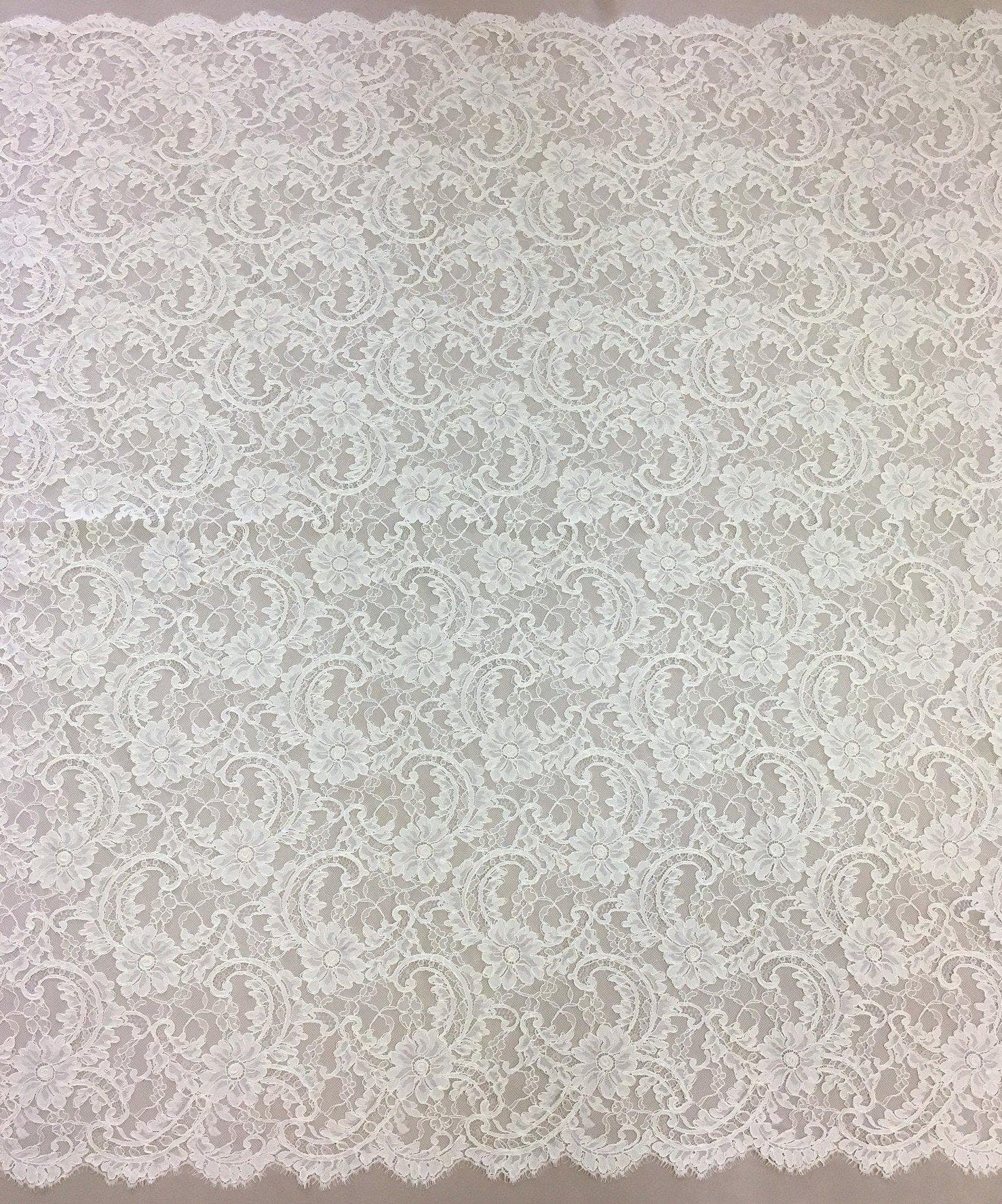 Ivory Floral Corded Lace — featuring scalloped edges, floral motifs and a corded texture, in nylon and viscose, 130cm wide