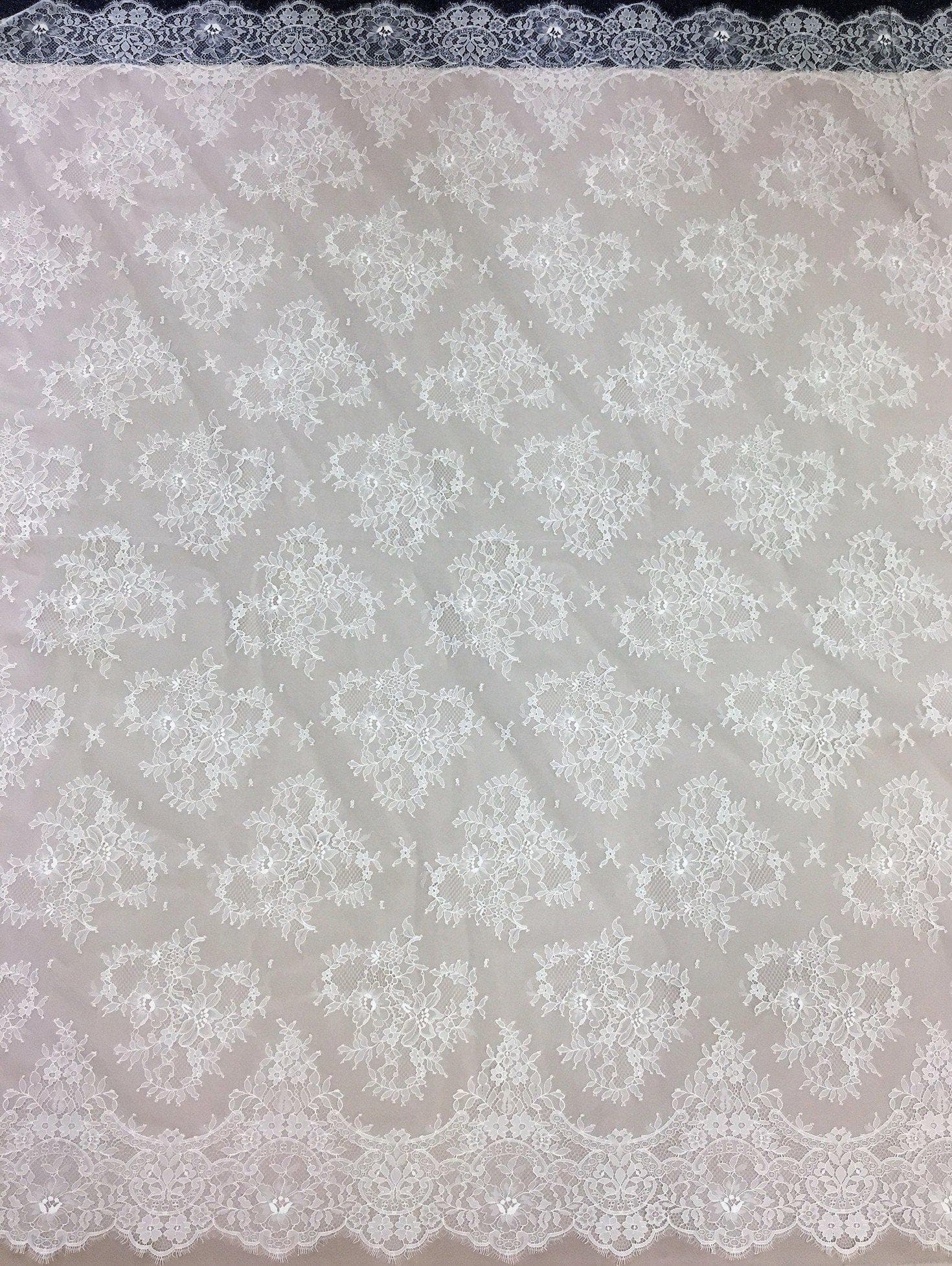 Ivory Delicate Floral Lace — featuring scalloped edges and floral motifs, in nylon, 140cm wide
