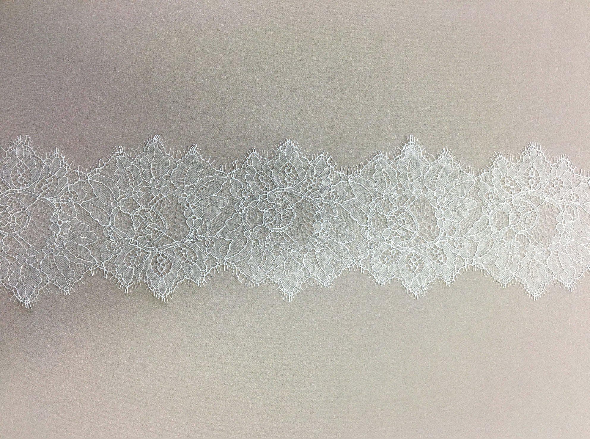 Ivory Fine floral lace trim — featuring scalloped edges, eyelash detail and floral motifs, in nylon, 13cm wide