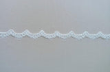 Light Ivory Corded Lace Trim — featuring scalloped edges, eyelash detail and floral motifs, in nylon and viscose, 3cm wide