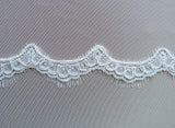Light Ivory Corded Lace Trim — featuring scalloped edges, eyelash detail and floral motifs, in nylon and viscose, 3cm wide