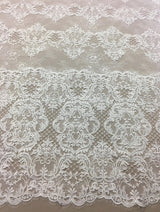 Ivory Floral Arabesque Fine Lace — featuring scalloped edges, eyelash detail, arabesque scrollwork and floral motifs, 130cm wide
