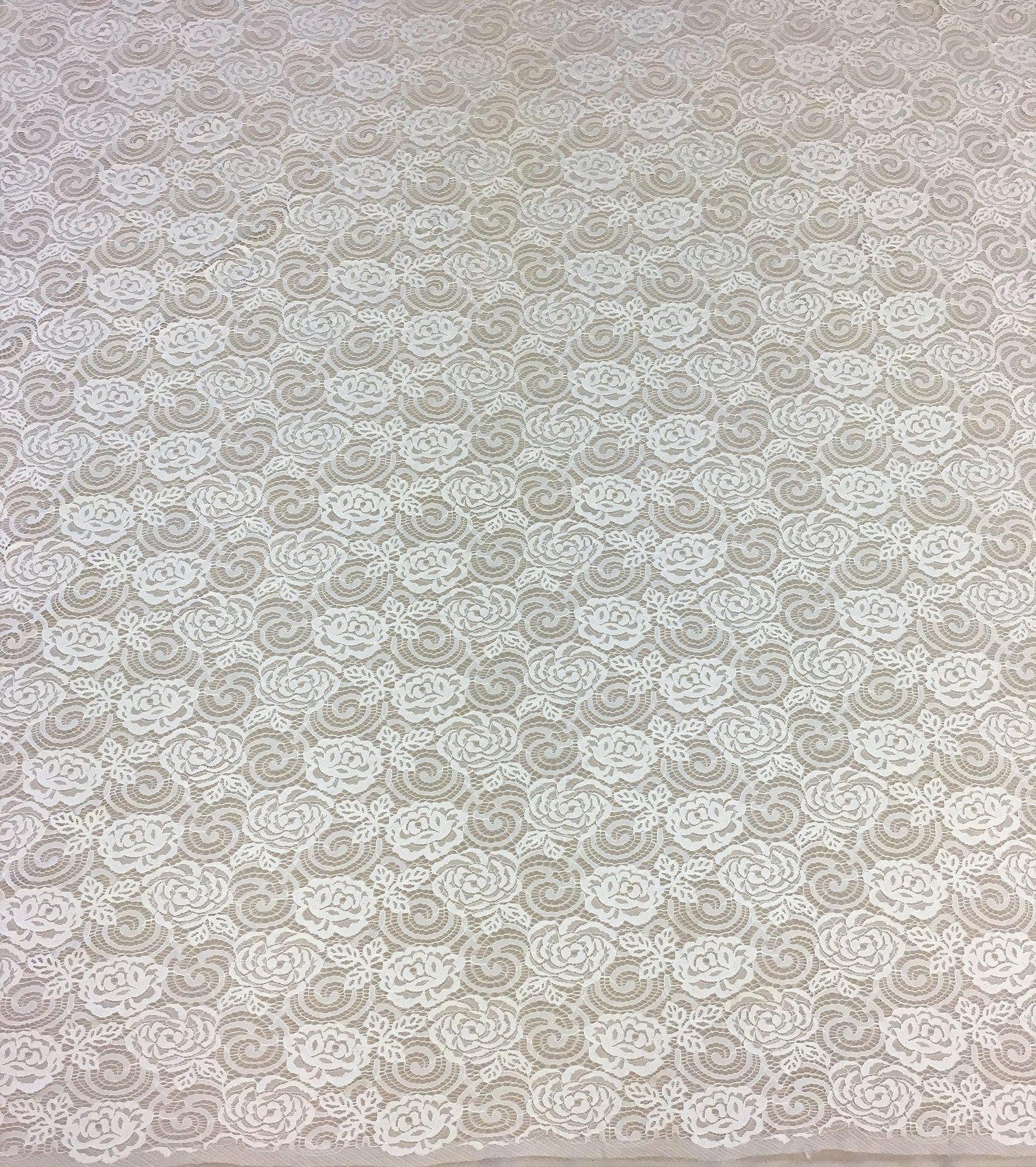 Ivory Spiral Rosette Fine Lace — featuring rosette motifs and scrolling swirls, in nylon, 140cm wide