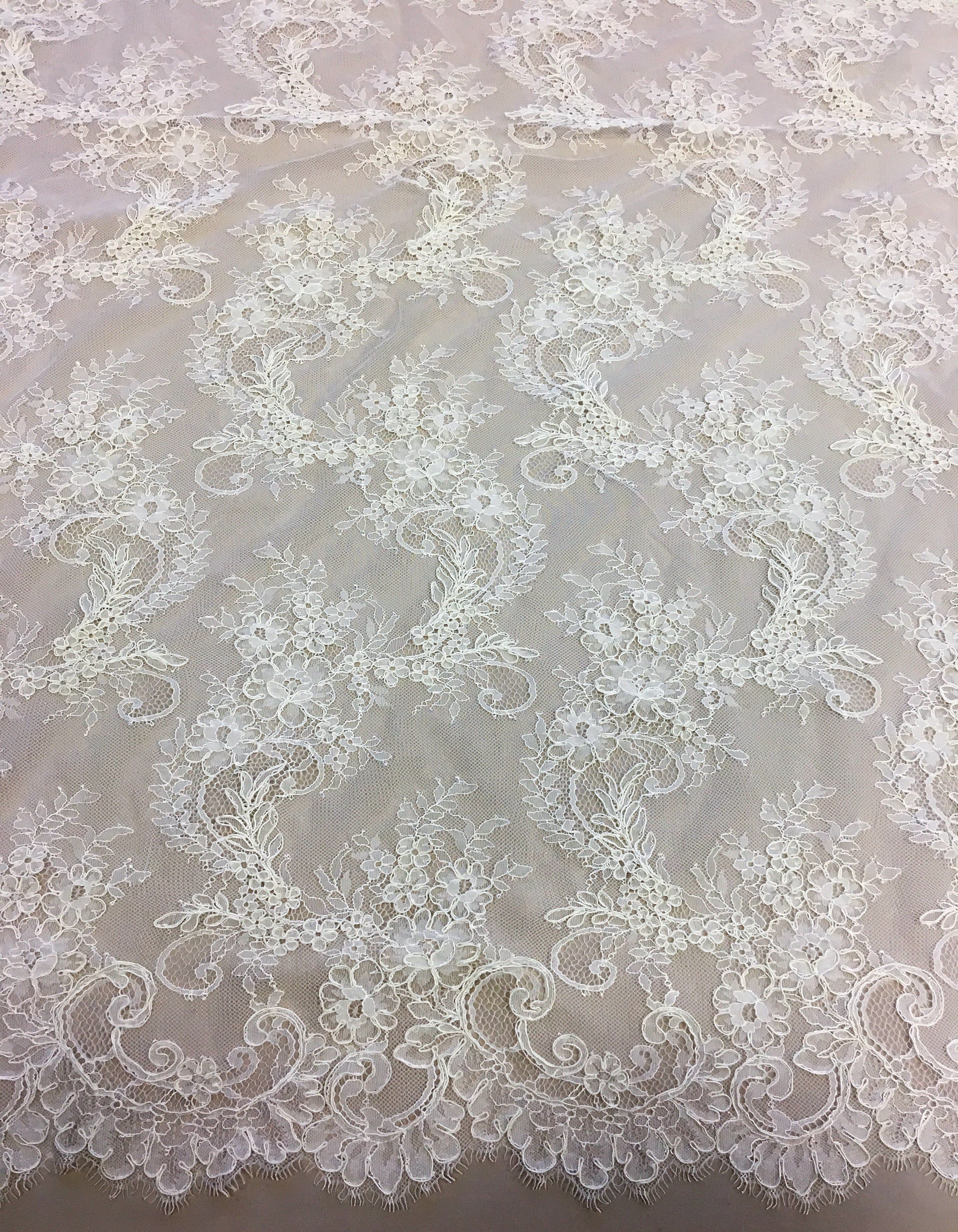Ivory Fine Corded Lace — featuring scalloped edges, floral motifs and a corded texture, in nylon, 140cm wide