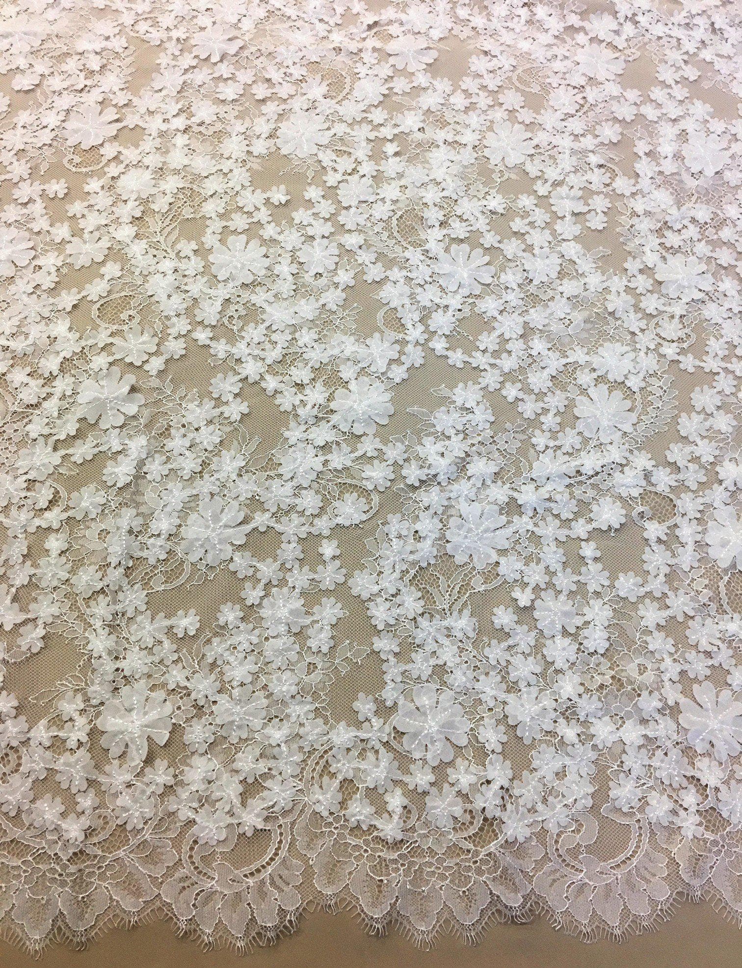 White 3D Floral Lace — featuring scalloped edges, floral motifs and a 3D floral design, in nylon and viscose, 130cm wide