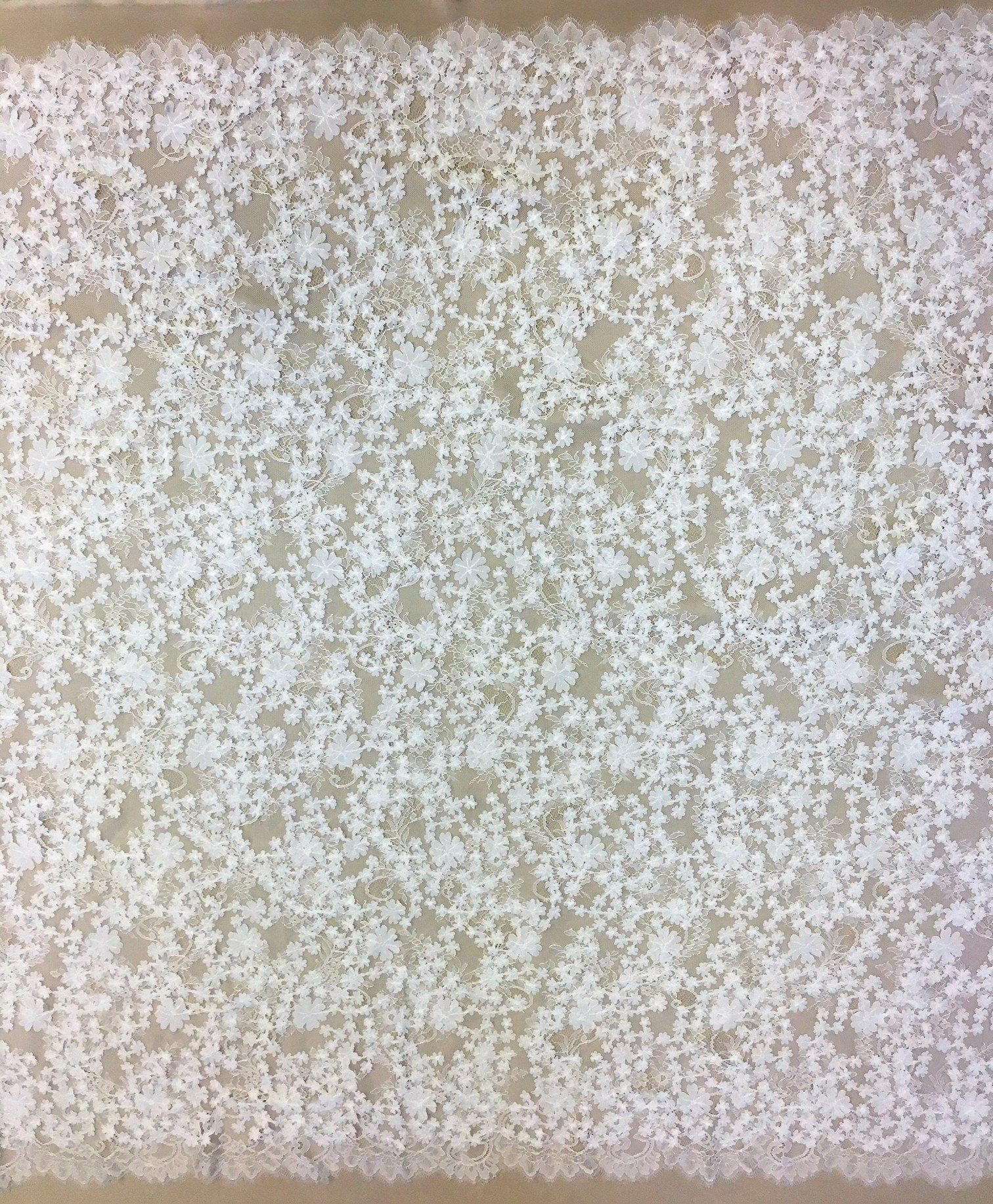 White 3D Floral Lace — featuring scalloped edges, floral motifs and a 3D floral design, in nylon and viscose, 130cm wide
