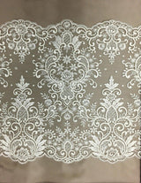 Ivory Beaded Lace Trim — featuring scalloped edges, eyelash detail and floral motifs, in nylon and viscose, 42cm wide