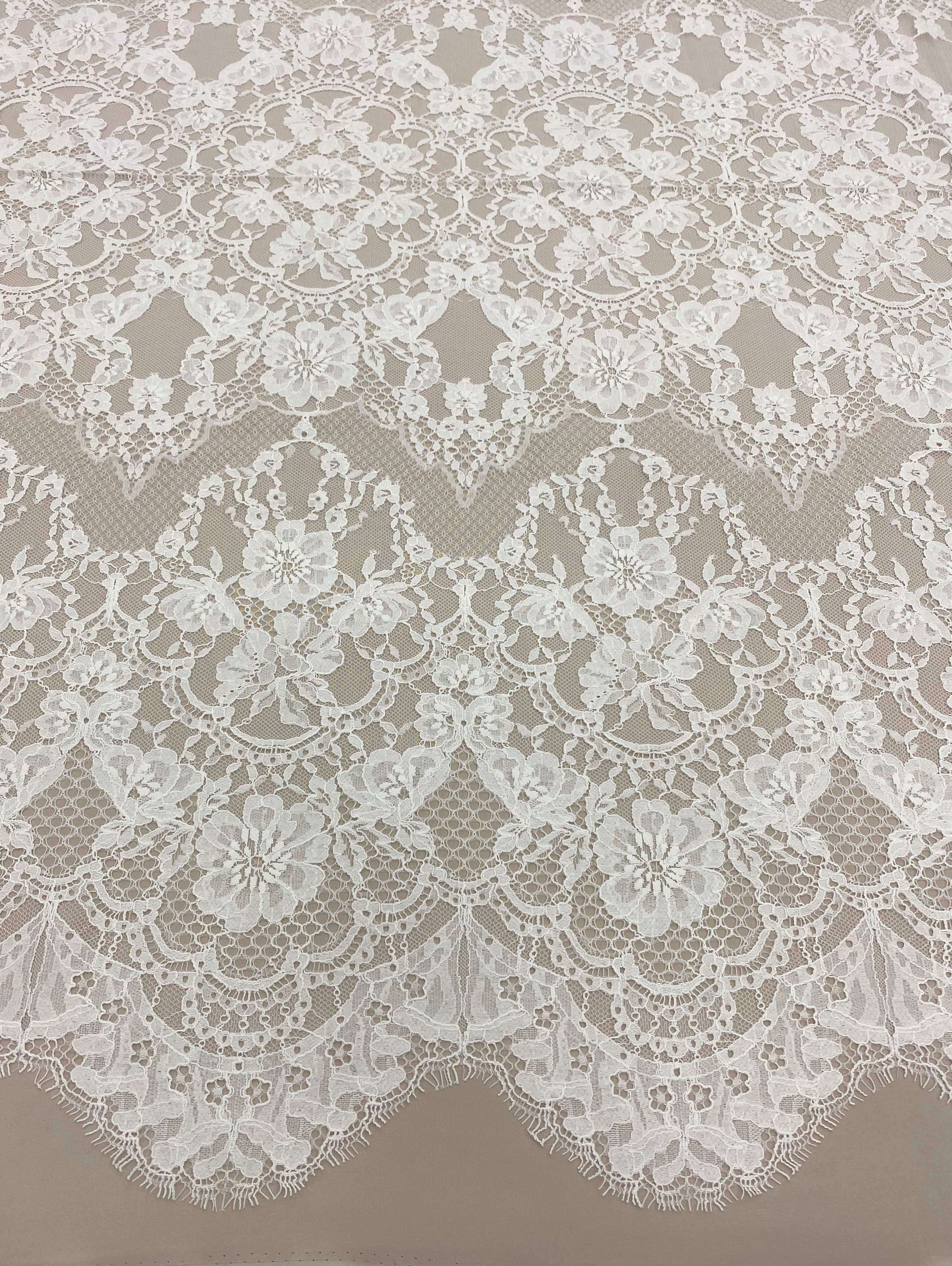 Ivory Fine Floral Lace — featuring scalloped edges and floral motifs, in cotton and nylon, 140cm wide