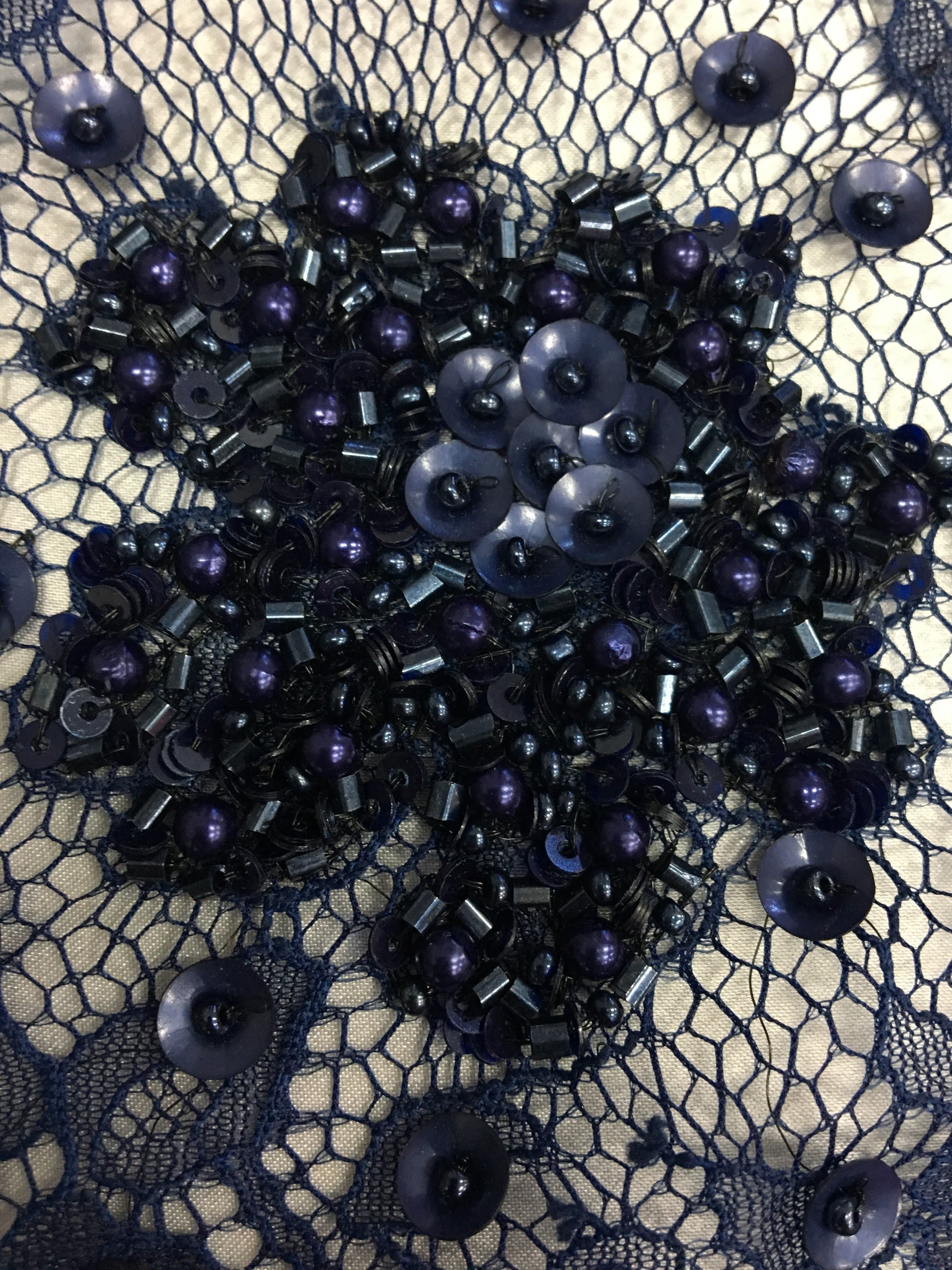 Navy Beaded Lace — featuring scalloped edges, eyelash detail and floral motifs, in nylon and viscose, 140cm wide