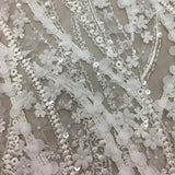 Ivory 3D Beaded Lace — featuring floral motifs, a 3D floral design and hand-beading, in nylon and viscose, 130cm wide